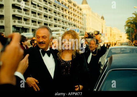 Jacques Medecin former Mayor of Nice South of France, arriving for a premier at the Cannes Film festival surrounded by the press.1980 1980s HOMER SYKES Stock Photo