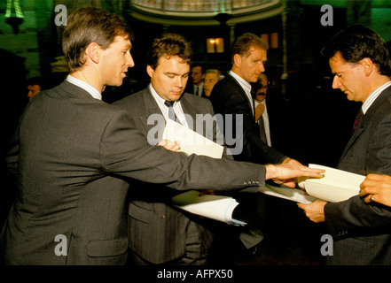 1990s City London, sharing information at weekly Monday morning meetings.  Shipping Brokers at the Baltic Exchange. England circa 1995  UK HOMER SYKES Stock Photo
