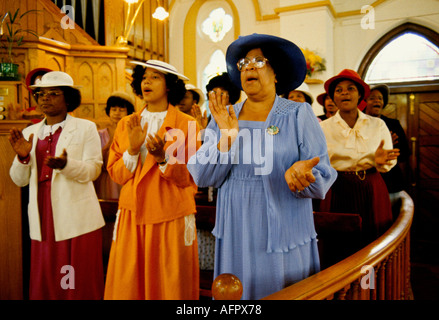 Pentecostal church service in Brixton 1990s faith UK Hymn singing clapping hands in time to music. Sunday worship south London 90s England HOMER SYKES Stock Photo