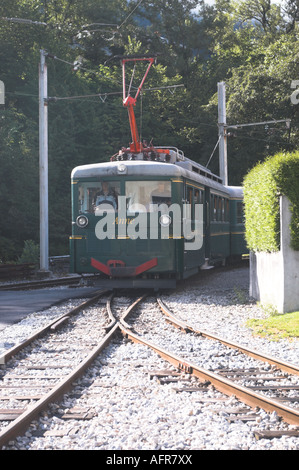 A Tramway du Mont Blanc (TMB) car prepares to enter the station at Saint Gervais le Fayet Stock Photo
