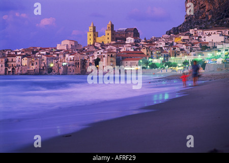 Duomo Cathedral above village of Cefalu on Mediterranean in Sicily Stock Photo