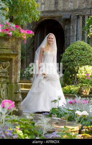 A bride wearing a bespoke handmade wedding dress by Becky Drinan. Picture by Jim Holden. Stock Photo