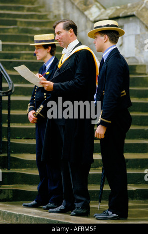 Eton College 1980s, the headmaster calling Absence - boys not allowed out of school until after this  Roll Call. 4th June Parents Day 1985 UK Windsor Stock Photo