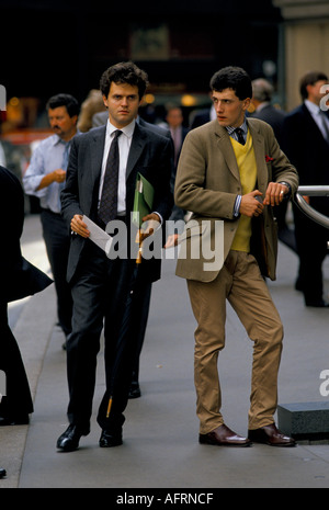 Dress Down Friday 1990s City of London Uk. Yuppies outside Lloyds of London in 1992 England. Wealthy working rich young adults HOMER SYKES Stock Photo