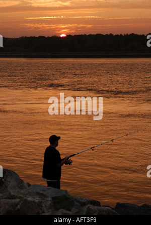 Fisherman at Sunset Stock Photo