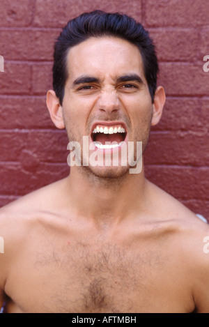 Young man yelling, portrait Stock Photo