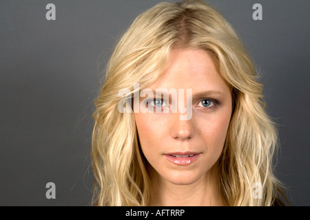 Young woman staring, close up, portrait Stock Photo