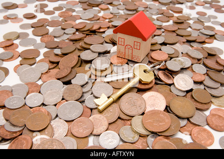 Savings invested in a new home or property keys to new house or home Stock Photo