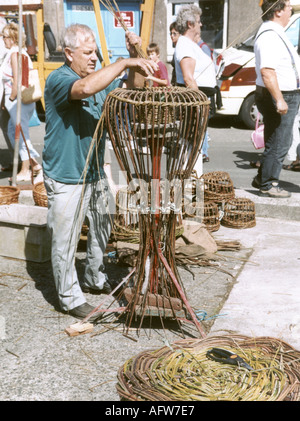 Making Lobster pots at Newlyn fish festival Cornwall England UK Great Britain Stock Photo