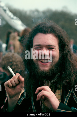 Hippy smoking marijuana marihuana legalise pot cannabis demonstration rally Hyde Park London 1970s 1979 Drug use UK HOMER SYKES Stock Photo