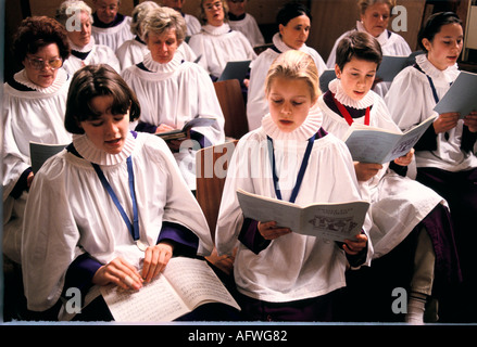 Church choir practice before Sunday morning church service. St Mary the Virgin Rye, Sussex 1990s. Young people and adults  HOMER SYKES Stock Photo