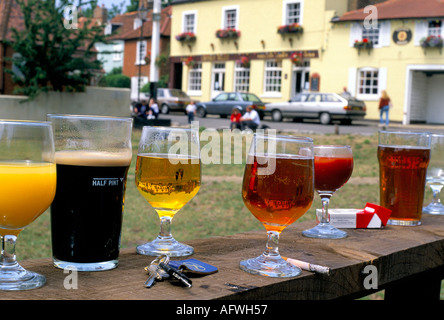Glasses beer, orange juice, packet of cigarettes and car keys outside pub garden table Wimbledon UK Dont Drink and Drive 2000s 2001 HOMER SYKES Stock Photo