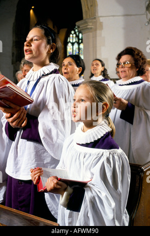 St Mary the Virgin church choir Rye, Sussex 1990s. Young people and adults getting involved practice before Sunday morning church service. HOMER SYKES Stock Photo