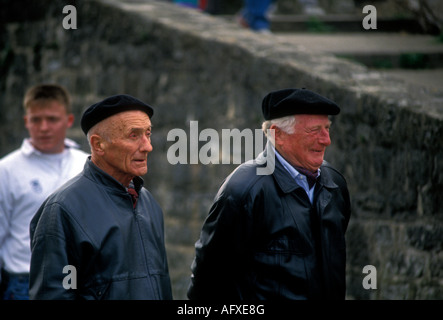 French Basque people adult men wearing black beret in the French Basque Country capital city of Bayonne France Stock Photo