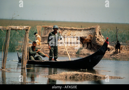 Iran Iraq war also known as First Persian Gulf War or Gulf War. 1984 Soldier in canoe Mesopotamian marshes 1980s HOMER SYKES Stock Photo
