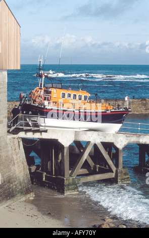 RNLI British Mersey lifeboat on slipway Sennen Cove Cornwall Stock Photo