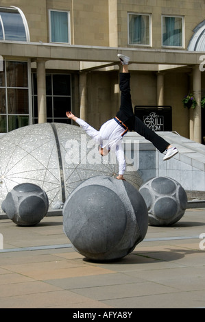 Korean break dancer performing in the streets of Edinburgh Stock Photo