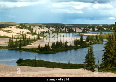 Sandy eskers and river near Whitefish lake in an area called The Barrenlands, Northwest Territories, Canada. Stock Photo