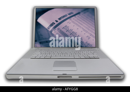 LAP TOP NOTE BOOK PERSONAL COMPUTER WITH SCREEN DISPLAYING PICTURE OF FINANCIAL PAPER Stock Photo