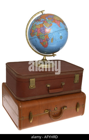Globe on Stack of Suitcases Stock Photo