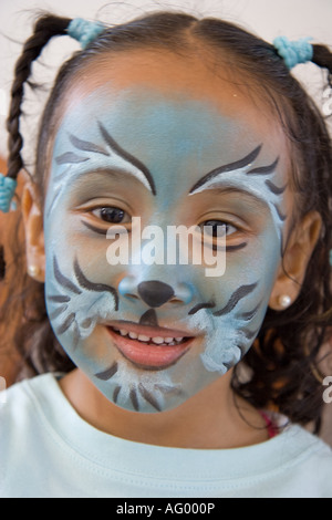 Pretty Girl Painted Face looking at Camera, Netherlands Stock Photo