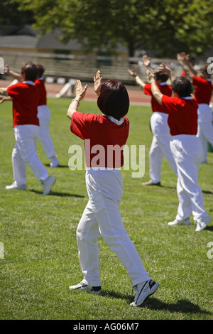 Asian seniors exercising in the park, Richmond near Vancouver, Canada Stock Photo