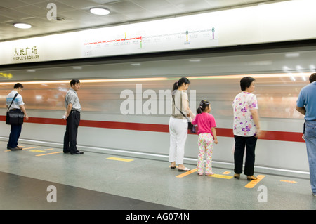 Passengers on Metro subway train during evening rush hour near People's Square Station in Shanghai. Stock Photo