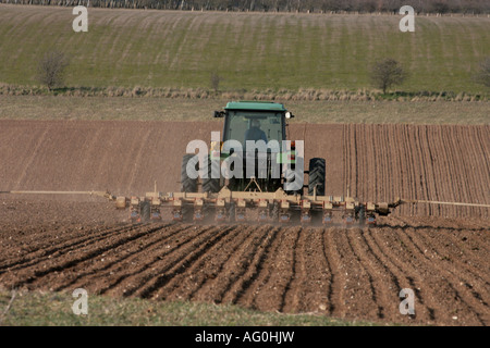 Tractor drilling sugar beet seed in Suffolk Stock Photo