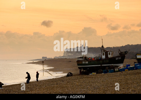 Fishing boat on Walmer beach at sunset in Deal, Kent, England Stock Photo