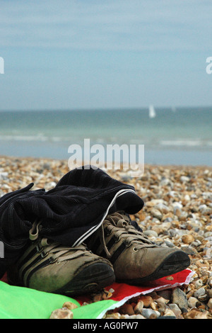 Shoes on the beach Stock Photo