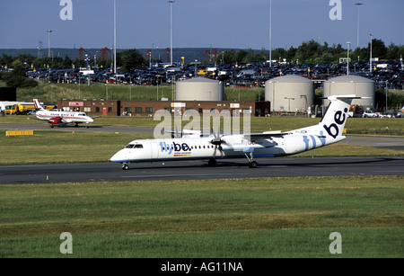 flybe DHC Dash Eight aircraft waiting to take off at Birmingham International Airport, West Midlands, England, UK Stock Photo