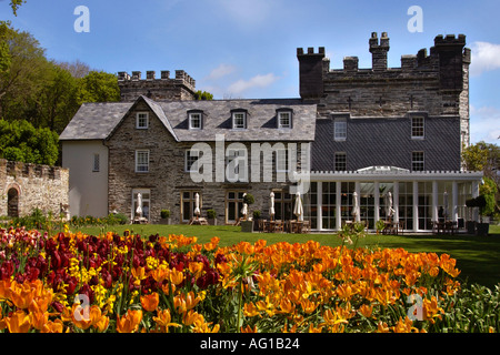 Castell Deudraeth luxury hotel formerly an early Victorian castellated mansion at Portmeirion Gwynedd North Wales UK Stock Photo