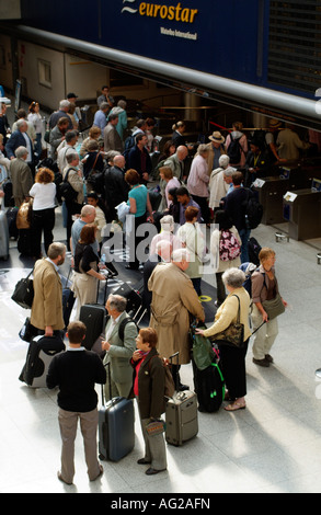 Group of Travellers Passengers Tourists with Luggage and Baggage Stock Photo