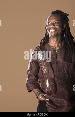 Portrait of mid adult man looking away and smiling Stock Photo