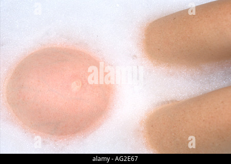 Australia Queensland pregnant woman in bubblebath MR available Stock Photo