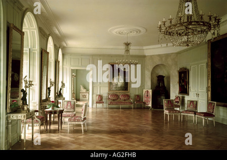 geography/travel, Germany, Hesse, Kassel, buildings, Wilhelmshöhe castle, interior view, 1786 - 1798, built by Simon Lois du Ry and Heinrich Christoph Jussow, historic, historical, Europe, architecture, castles, classicism, Wilhelmshoehe, Wilhelmshohe, table, chairs, stove, Additional-Rights-Clearance-Info-Not-Available Stock Photo