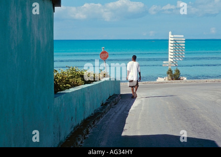 Street leading to the shore in Tarpum Bay on the island of Eleuthera Bahamas Stock Photo