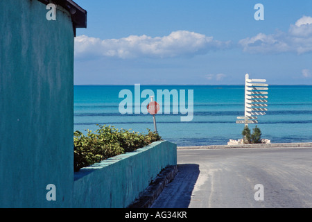 Street leading to the shore in Tarpum Bay on the island of Eleuthera Bahamas Stock Photo