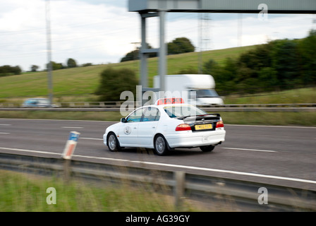 taxi on M62 in Huddersfield Stock Photo