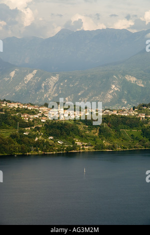 Caldonazzo lake with white alps in the background, Pergine Valsugana, Trento, Trentino Alto Adige, Italy Stock Photo