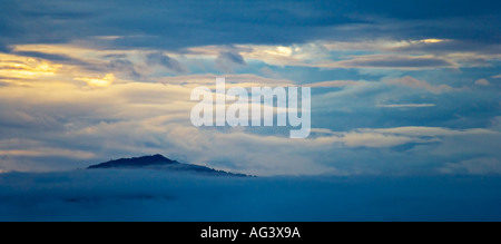 Dramatic dawn skies and mountain landscape in the Himalayan kingdom of Nepal Stock Photo