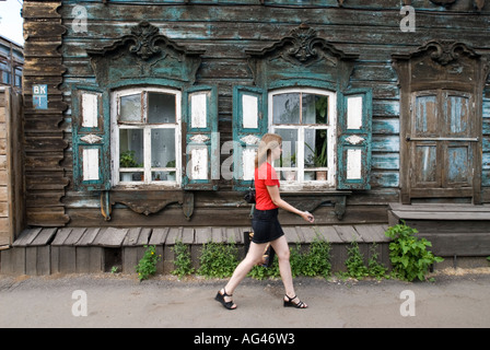 Old ornate wooden windows in house in Irkutsk Siberia Russia 2006 Stock Photo