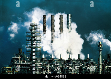 Pollution. heavy industrial planet. Smoke and steam escaping. Chimneys. Climate change. Stock Photo