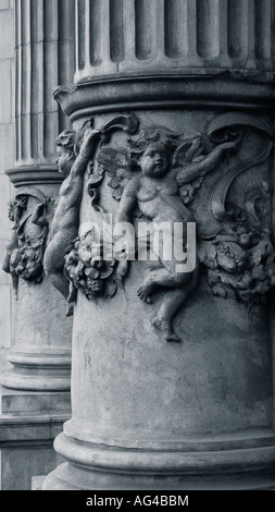 Cherub detail on old architectural pillar. Stock Photo