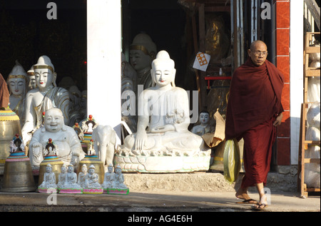 Buddha statues for sale a shop outside the Schwedagon Paya in Myanmar Burma Stock Photo