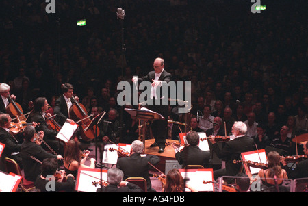 The late Italian film composer Ennio Morricone (1928-2020) conducting the Rome Symphony Orchestra, London, UK. Stock Photo