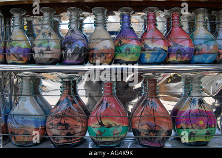 Stack of sand bottles with different kinds of coloured sand taken from Petra gorge for sale in a souvenir shop in Amman Jordan Stock Photo