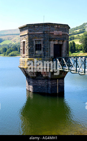 View over Talybont Reservoir valve tower in the Brecon Beacons National Park Powys South Wales UK Stock Photo