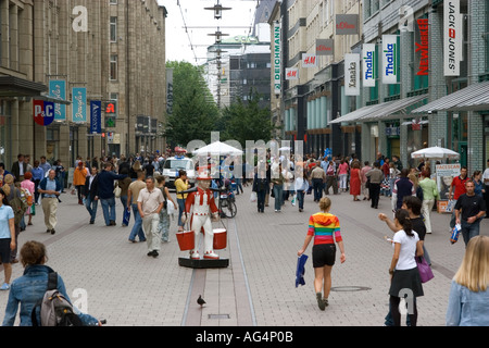 Germany Hamburg People walking at Spitalerstrasse a pedestrian street with many shop in the Altstadt old Town Stock Photo