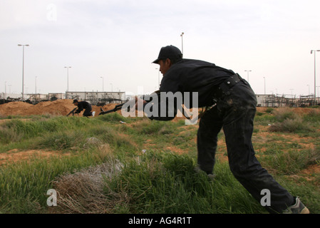 Iraqi police recruits training with AK47 s Stock Photo